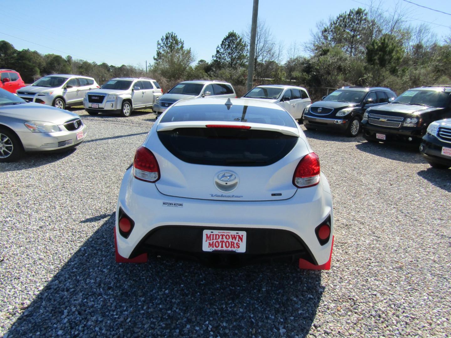 2014 White /Red Hyundai Veloster (KMHTC6AE3EU) with an 4 CYL engine, 6-Speed Manual transmission, located at 15016 S Hwy 231, Midland City, AL, 36350, (334) 983-3001, 31.306210, -85.495277 - Photo#5